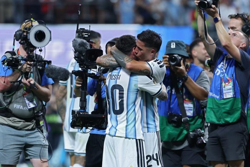 Argentina's forward #10 Lionel Messi celebrates with Argentina's midfielder #24 Enzo Fernandez after winning the 2026 World Cup round of 16 football match between Argentina and Egypt at Atlanta Stadium in Atlanta on July 7, 2026. Thomas COEX / AFP