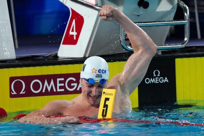 Neutral Athlete B's Egor Kornev celebrates winning the final of the men's 50m butterfly swimming event during the LEN European Aquatics Championships at the Olympic Aquatic Centre in Saint-Denis, northern suburbs of Paris, on August 11, 2026. Dimitar DILKOFF / AFP