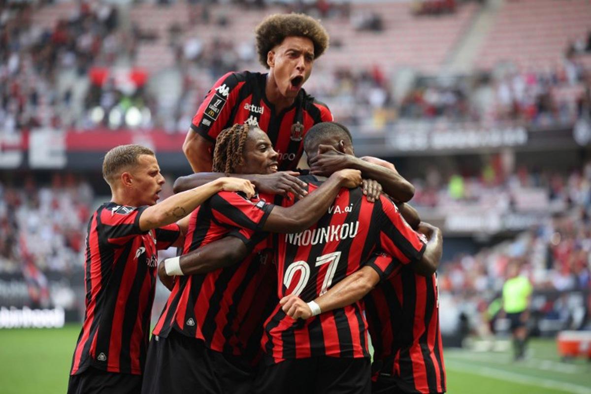 Nice's players celebrate after scoring a first goal during the French L1 football match between OGC Nice and Lille LOSC at the Allianz Riviera Stadium in Nice, south-eastern France, on September 20, 2026. Valery HACHE / AFP