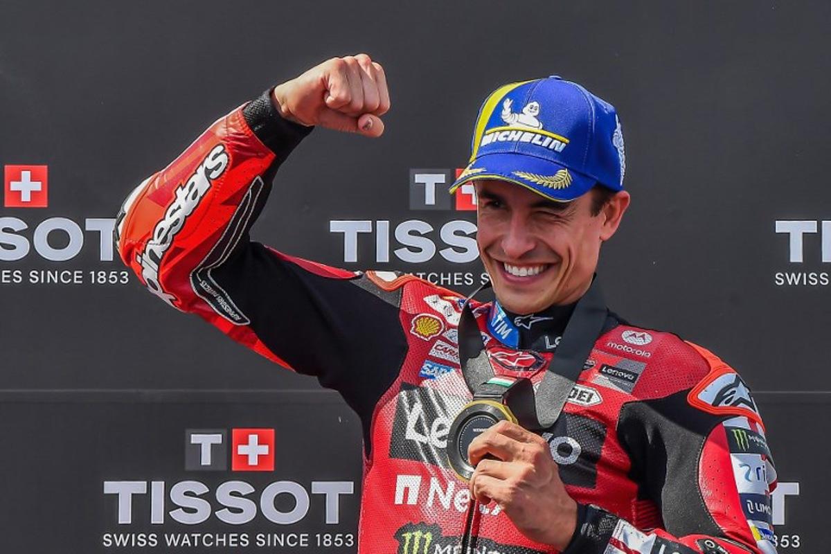 Team Ducati Lenovo Team's Marc Marquez celebrates winning the Sprint competition at the Balaton Park Circuit in Balatonfokajar, Hungary, on June 6, 2026, ahead of the Hungarian Motorcycle MotoGP Grand Prix. FERENC ISZA / AFP