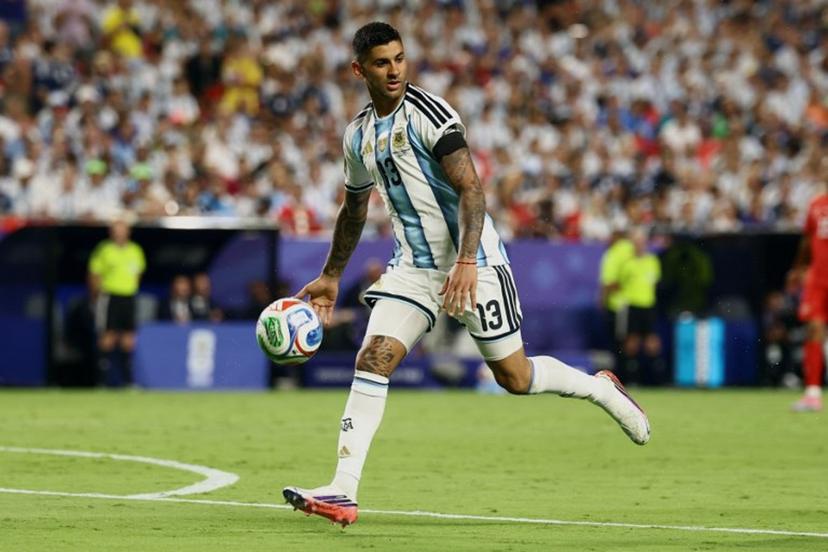 Argentina's defender #13 Cristian Romero runs during the 2026 World Cup football tournament quarter-final match between Argentina and Switzerland at the Kansas City Stadium in Kansas City on July 11, 2026. CHARLY TRIBALLEAU / AFP