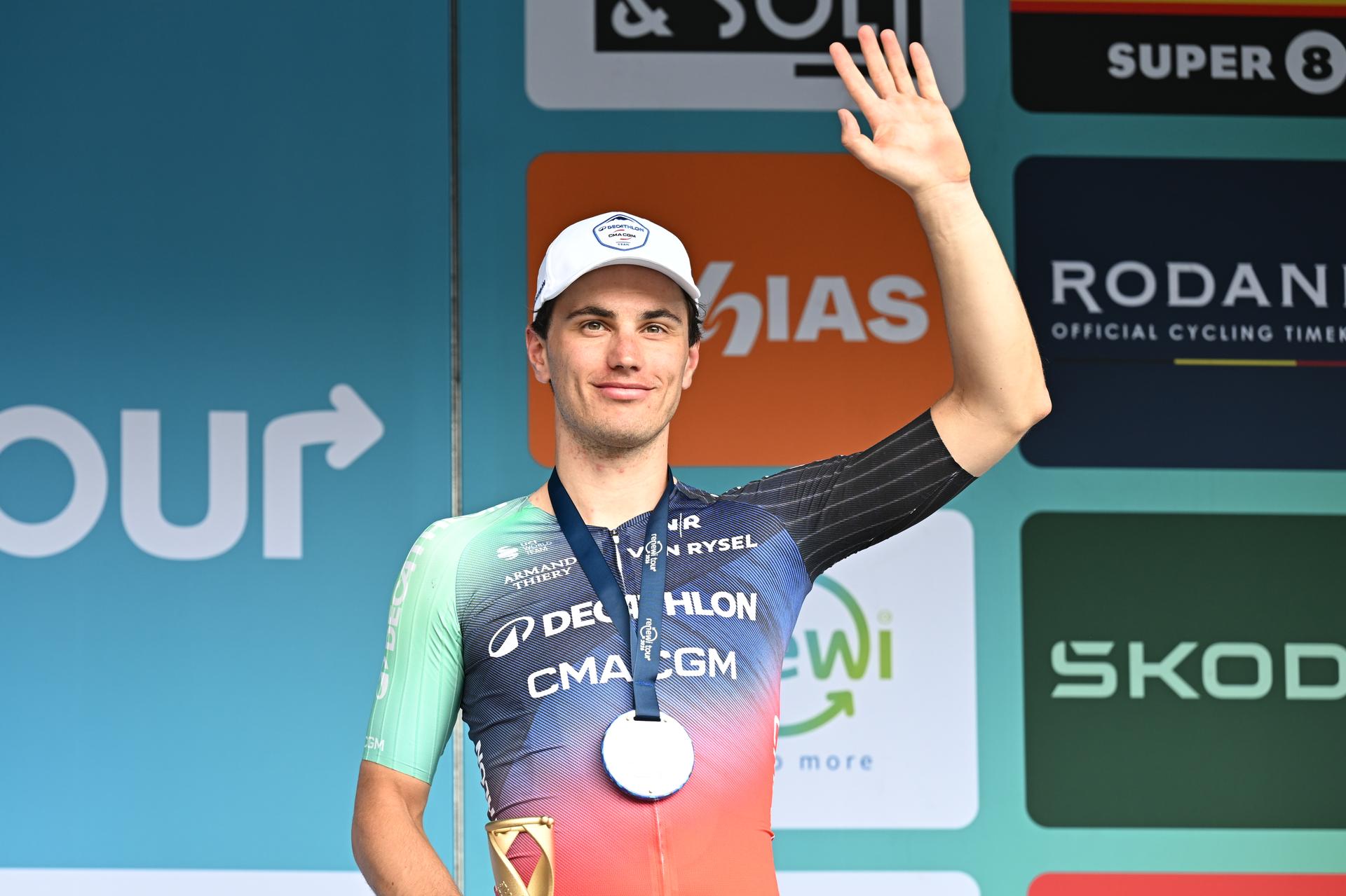 Belgian Arnaud De Lie pictured on the podium after the fifth and last stage of the 'Renewi Tour' multi-stage cycling race, from and to Leuven (183,7 km) on Sunday 23 August 2026. The five-day race takes place from 19 to 23/08. BELGA PHOTO DAVID PINTENS