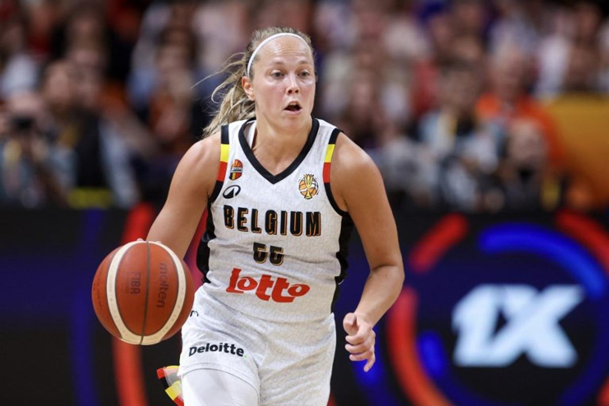 Belgium's point guard #55 Julie Allemand dribbles during the FIBA Women's Basketball World Cup quarter-final match between Belgium and Germany at the Berlin Arena in Berlin on September 10, 2026. Ronny HARTMANN / AFP
