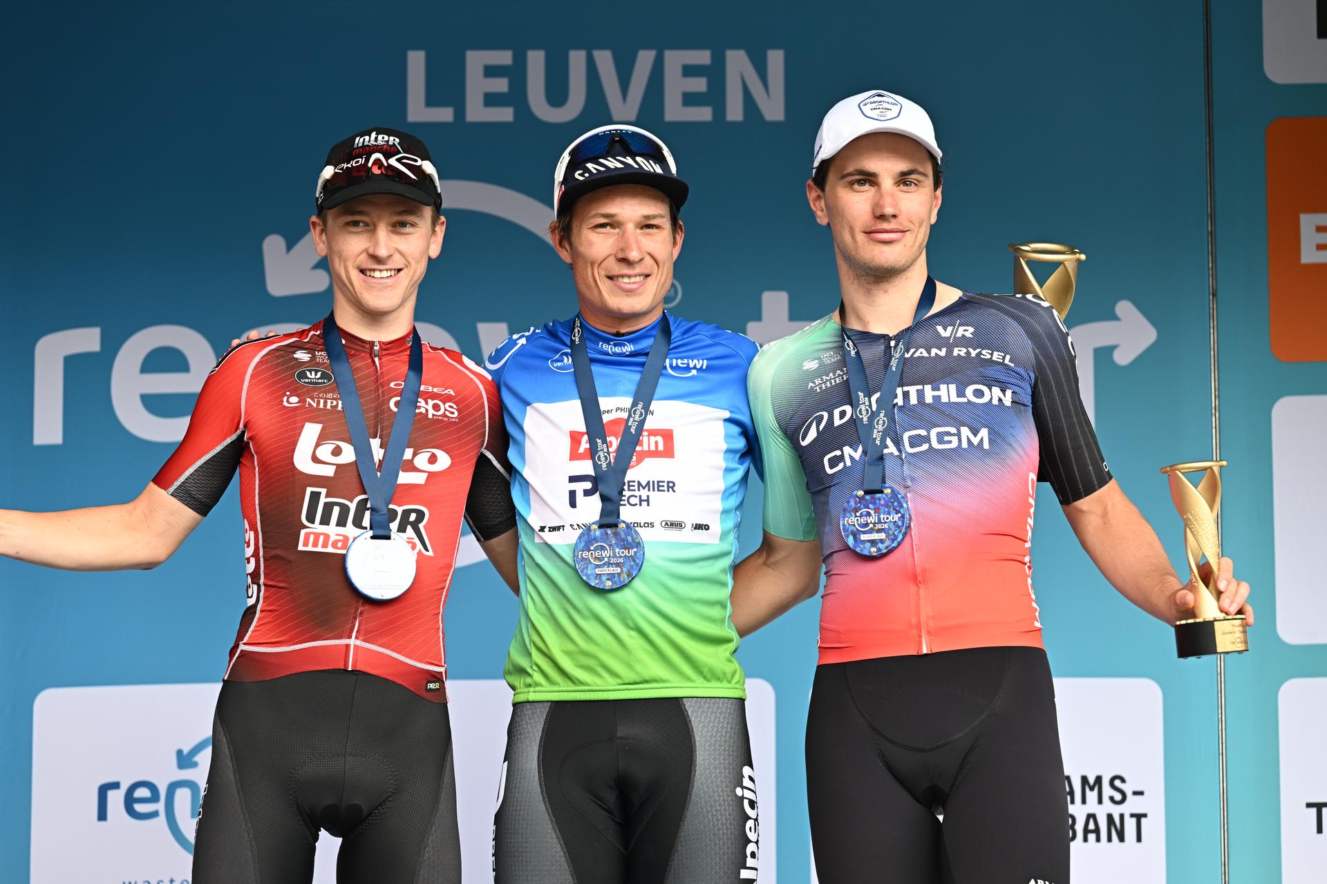 Italian Luca Mozzato ; Belgian Jasper Philipsen, and Belgian Arnaud De Lie pictured on the podium after the fifth and last stage of the 'Renewi Tour' multi-stage cycling race, from and to Leuven (183,7 km) on Sunday 23 August 2026. The five-day race takes place from 19 to 23/08. BELGA PHOTO DAVID PINTENS