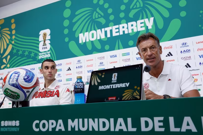 Tunisia's French head coach Herve Renard (R) and midfielder #17 Ellyes Skhiri give an MD-1 press conference at the Monterrey Stadium in Guadalupe, Mexico on June 19, 2026, on the eve of the 2026 World Cup Group F football match between Tunisia and Japan. Julio Cesar AGUILAR / AFP