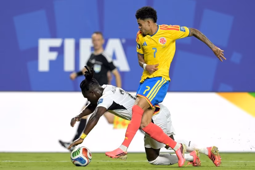 Ghana's defender #02 Alidu Seidu and Colombia's forward #07 Luis Diaz fight for the ball during the 2026 World Cup round of 32 football match between Colombia and Ghana at the Kansas City Stadium in Kansas City on July 3, 2026. JUAN MABROMATA / AFP