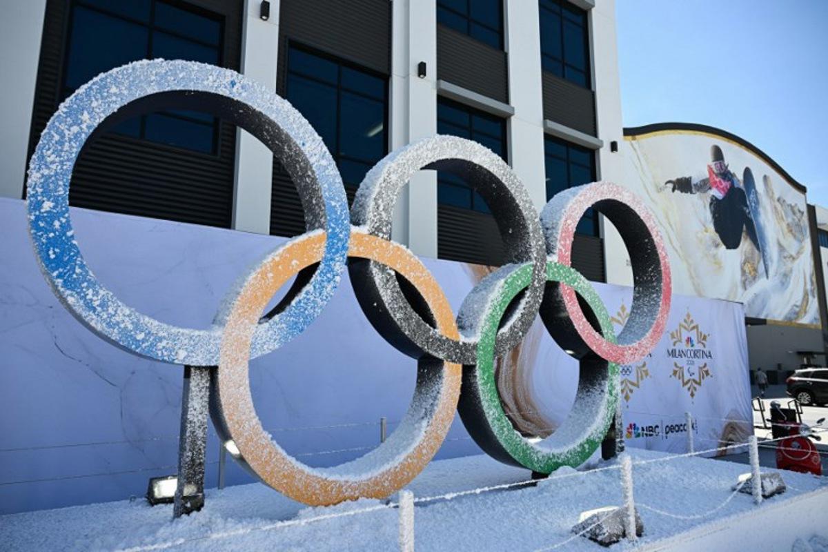 The Olympic Rings are displayed outside a sound stage during an NBC Universal Team USA filming event ahead of the 2026 Winter Olympics at the Sunset Glenoaks studios in Los Angeles, California on May 21, 2025. Patrick T. Fallon / AFP