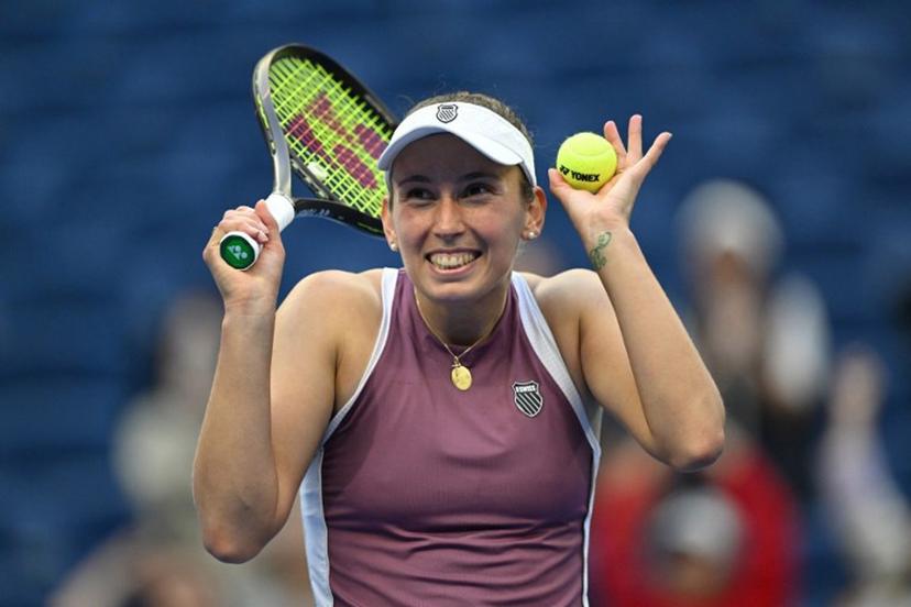 Belgium's Elise Mertens reacts as she celebrates her victory against USA's Coco Gauff during their women's singles match at the China Open tennis tournament in Beijing on October 7, 2026. Adek BERRY / AFP