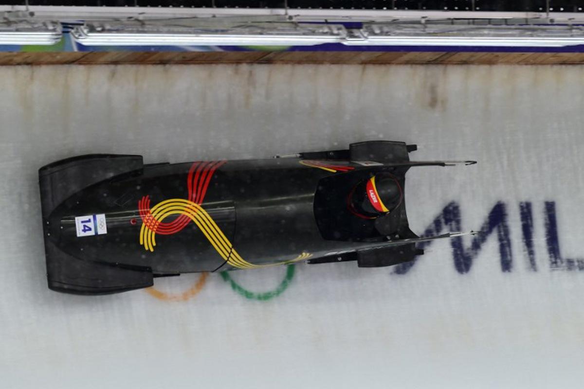 Belgium's Kelly van Petegem takes part in the bobsleigh women's monobob training session at Cortina Sliding Centre during the Milano Cortina 2026 Winter Olympic Games in Cortina d'Ampezzo on February 14, 2026. Stefano RELLANDINI / AFP