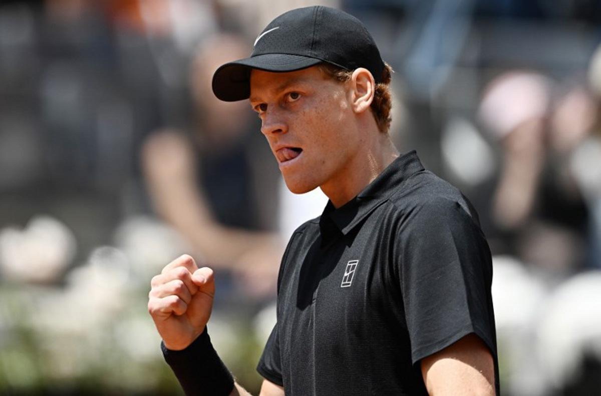 Italy's Jannik Sinner celebrates a point against Russia's Andrey Rublev during the ATP Rome Open tennis tournament at Foro Italico in Rome on May 14, 2026. Tiziana FABI / AFP