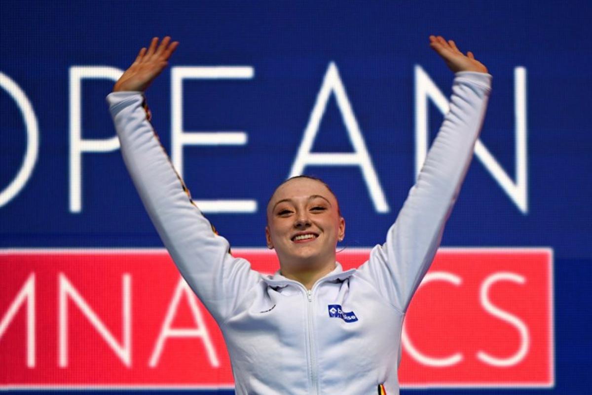 Bronze medallist Belgium's Lisa Vaelen waves on the podium of the women's vault at the 2023 Artistic Gymnastics European Championships in Antalya, on April 15, 2023. OZAN KOSE / AFP
