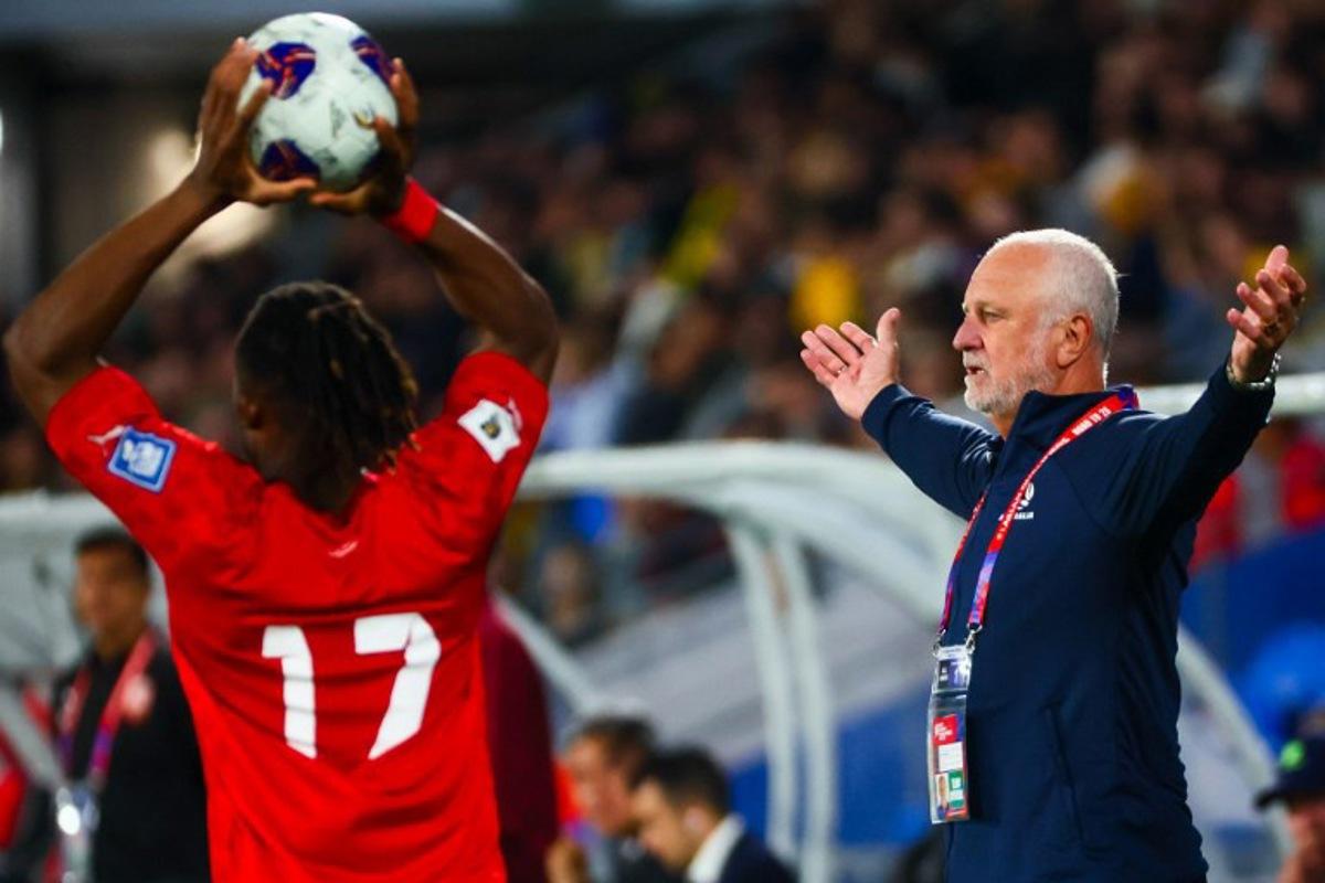 Australia's coach Graham Arnold (R) reacts during the 2026 FIFA World Cup AFC qualifiers football match between Australia and Bahrain at Cbus Super Stadium on the Gold Coast on September 5, 2024. Patrick HAMILTON / AFP