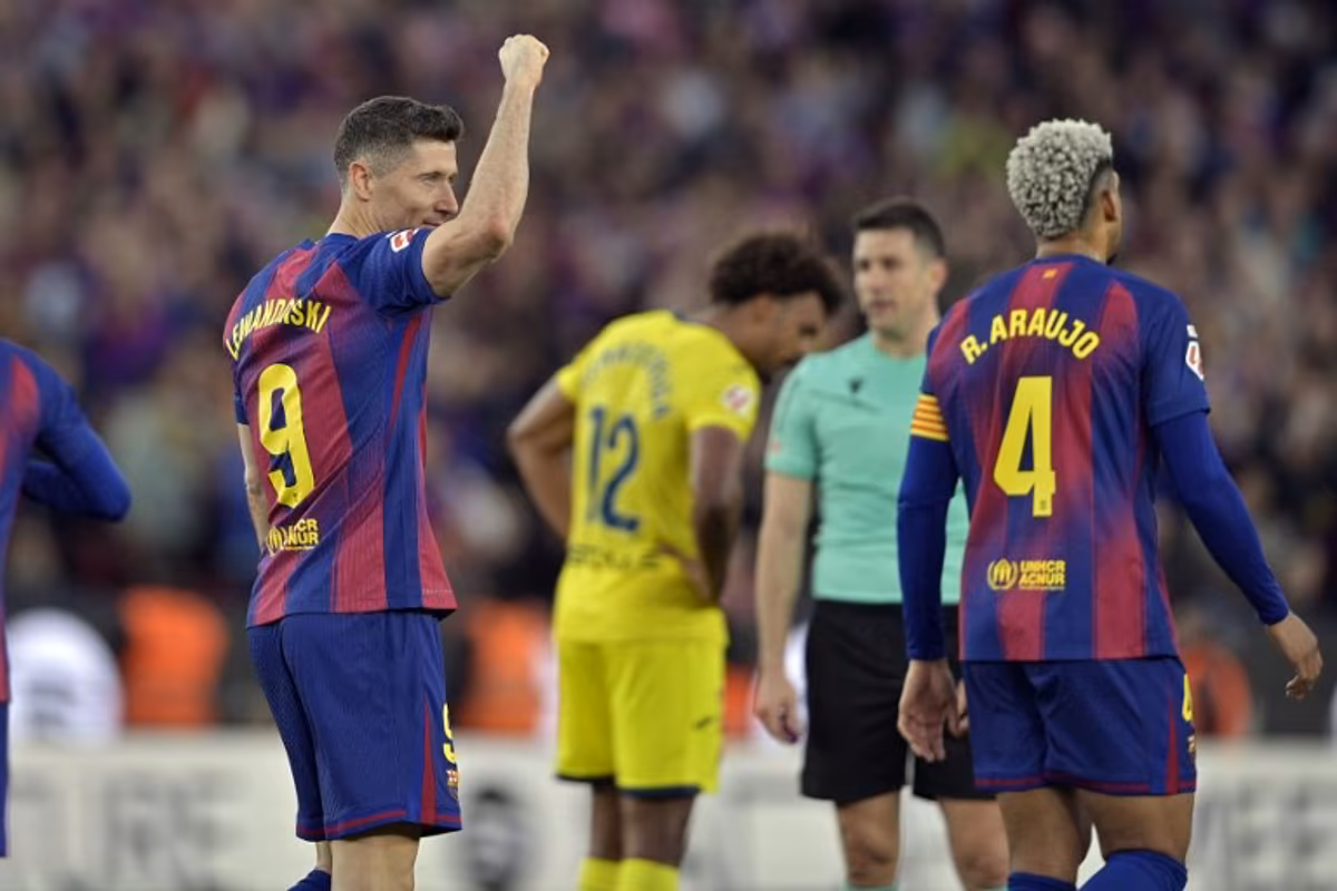 Barcelona's Polish forward #09 Robert Lewandowski celebrates scoring his team's fourth goal during the Spanish league football match between FC Barcelona and Villarreal CF at Camp Nou Stadium in Barcelona on February 28, 2026. MANAURE QUINTERO / AFP