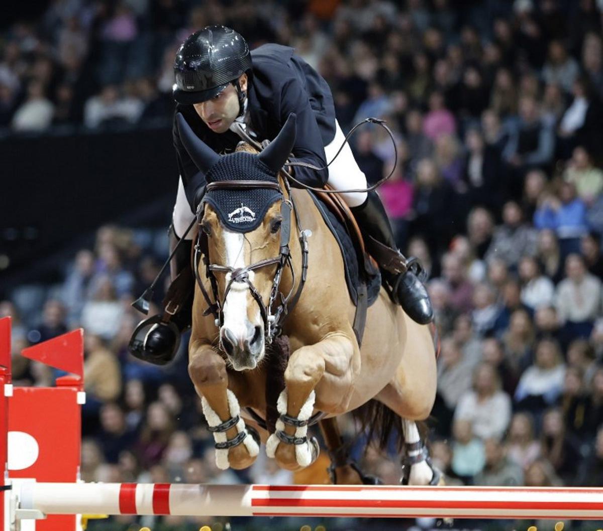 Belgium's Abdel Said rides Arpege du RU during the Grand Prix jumping competition of the Sweden International Horse Show, at the Friends Arena in Stockholm, on November 27, 2022. Christine OLSSON / TT News Agency / AFP