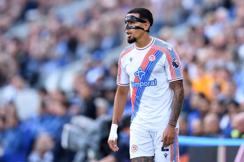 Crystal Palace's Colombian defender #02 Daniel Munoz wears a face protecting mask during the English Premier League football match between Everton and Crystal Palace at Hill Dickinson Stadium in Liverpool, north west England on August 22, 2026. PETER POWELL / AFP