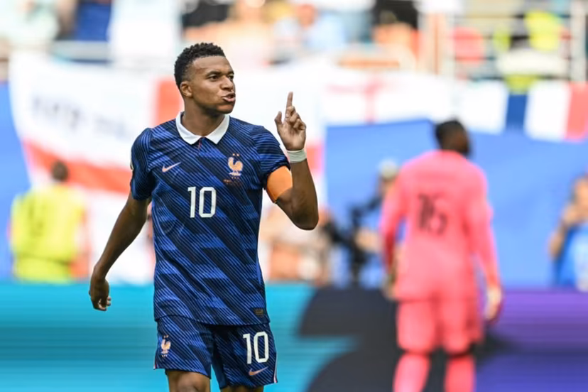 France's forward #10 Kylian Mbappe celebrates scoring his team's third goal during the 2026 World Cup football tournament third-place match between France and England at the Miami Stadium in Miami on July 18, 2026. CHANDAN KHANNA / AFP