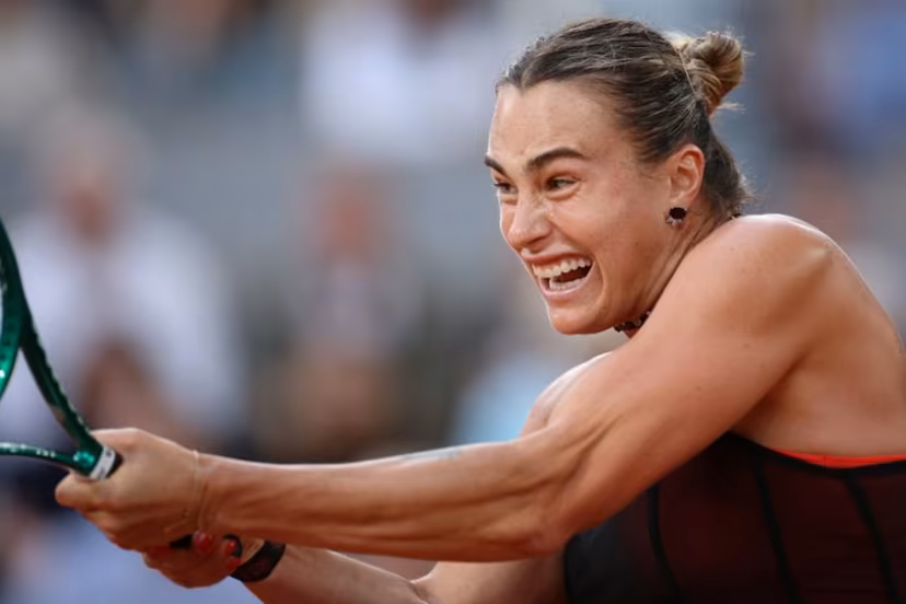 Aryna Sabalenka plays a backhand return to Japan's Naomi Osaka during their women's singles match on day 9 of the French Open tennis tournament on Court Philippe-Chatrier at the Roland-Garros Complex in Paris on June 1, 2026. ALAIN JOCARD / AFP