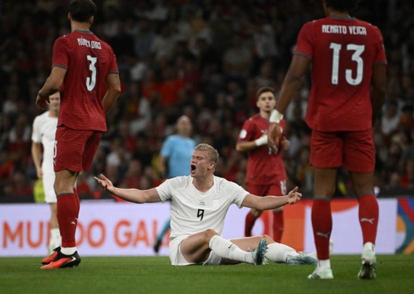 Norway's forward #09 Erling Haaland reacts after falling during the UEFA Nations League Group 4 football match between Portugal and Norway at Dragao stadium in Porto on October 3, 2026. Miguel RIOPA / AFP