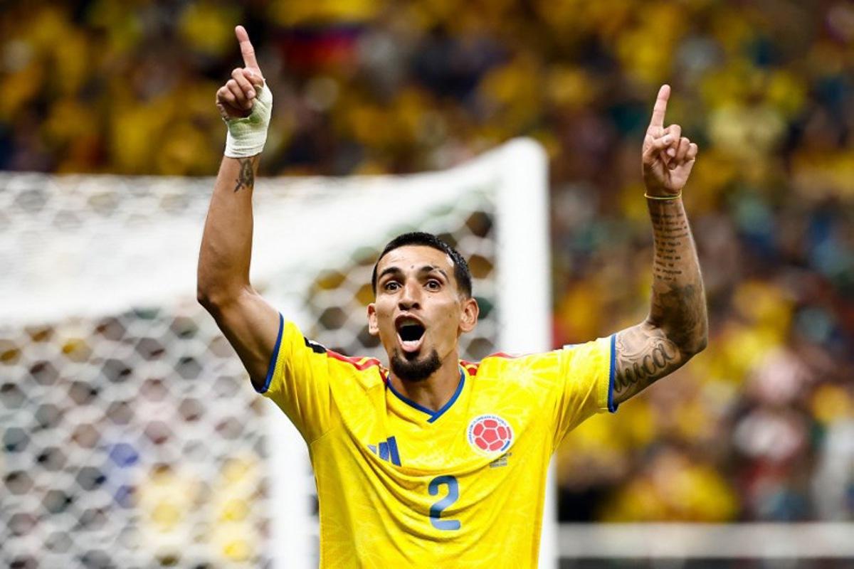 Colombia's defender #02 Daniel Munoz celebrates scoring his team's first goal during the 2026 World Cup Group K football match between Colombia and Democratic Republic of Congo at the Guadalajara Stadium in Zapopan on June 23, 2026. Ulises RUIZ / AFP