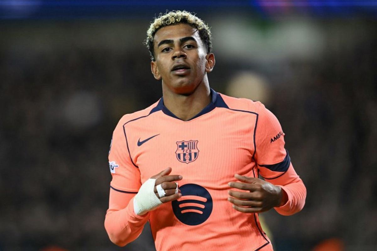 Barcelona's Spanish forward #10 Lamine Yamal celebrates scoring the equalizing 2-2 goal during the UEFA Champions League league phase day 4 football match between Club Brugge and FC Barcelona at Jan Breydelstadion stadium, in Bruges, on November 5, 2025. NICOLAS TUCAT / AFP