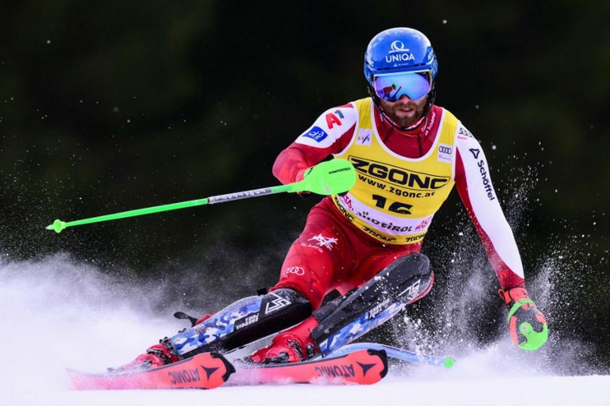 Austria's Marco Schwarz competes in the first run of the Men's Slalom event, part of the FIS Alpine Ski World Cup 2025-2026, in Alta Badia, northern Italy, on December 22, 2025. Stefano RELLANDINI / AFP