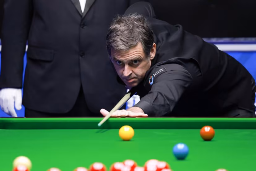 Britain's Ronnie O'Sullivan plays a shot during Frame 1 of his match against Ryan Day of Wales at the Snooker World Open in Yushan, in China's Jiangxi province on March 20, 2026. Seven-time world champion Ronnie O'Sullivan made professional snooker history on March 20 by crafting the highest break ever of 153 at the World Open in China. CN-STR / AFP