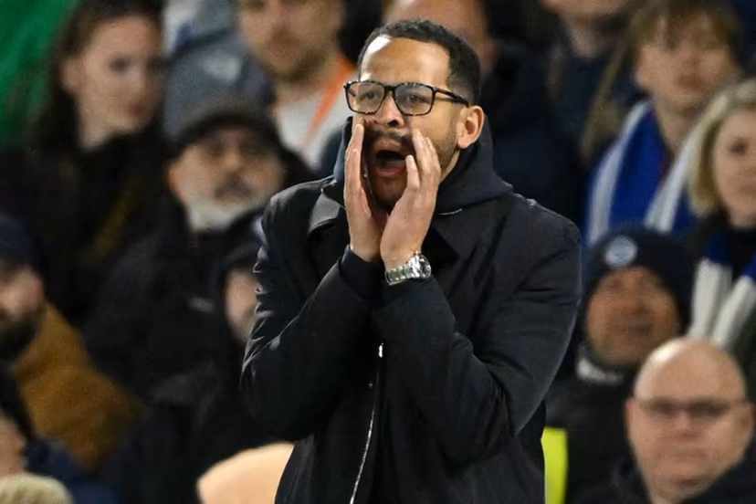 Chelsea's English head coach Liam Rosenior gestures on the touchline during the English Premier League football match between Brighton and Hove Albion and Chelsea at the American Express Community Stadium in Brighton, southern England on April 21, 2026. Glyn KIRK / AFP