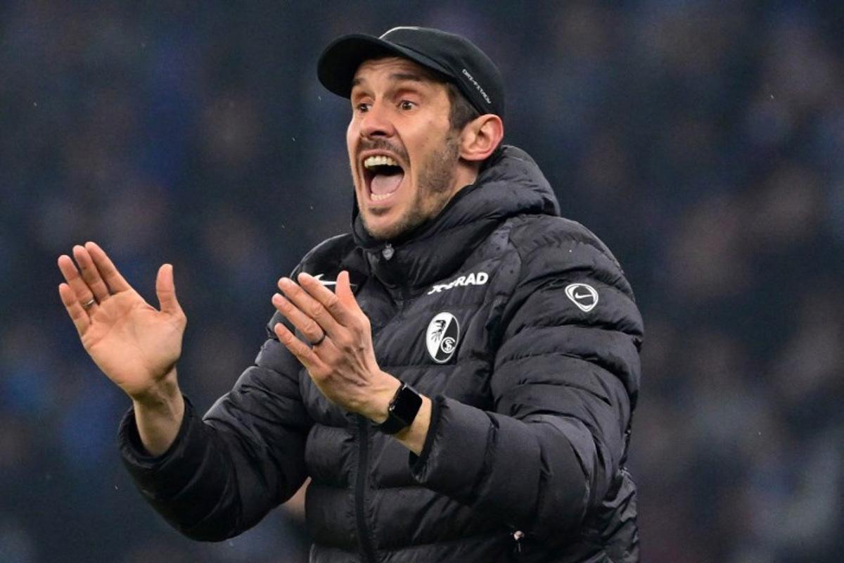 Freiburg's German head coach Julian Schuster reacts from the sidelines during the German Cup (DFB-Pokal) quarter-final football match between Hertha Berlin and SC Freiburg in Berlin on February 10, 2026. John MACDOUGALL / AFP