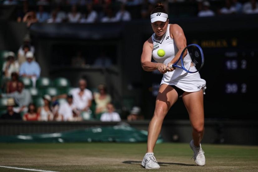 Czech Republic's Linda Noskova returns to Ukraine's Marta Kostyuk during their women's singles semi-final tennis match on the eleventh day of the 2026 Wimbledon Championships at The All England Lawn Tennis and Croquet Club in Wimbledon, southwest London, on July 9, 2026. Henry NICHOLLS / AFP