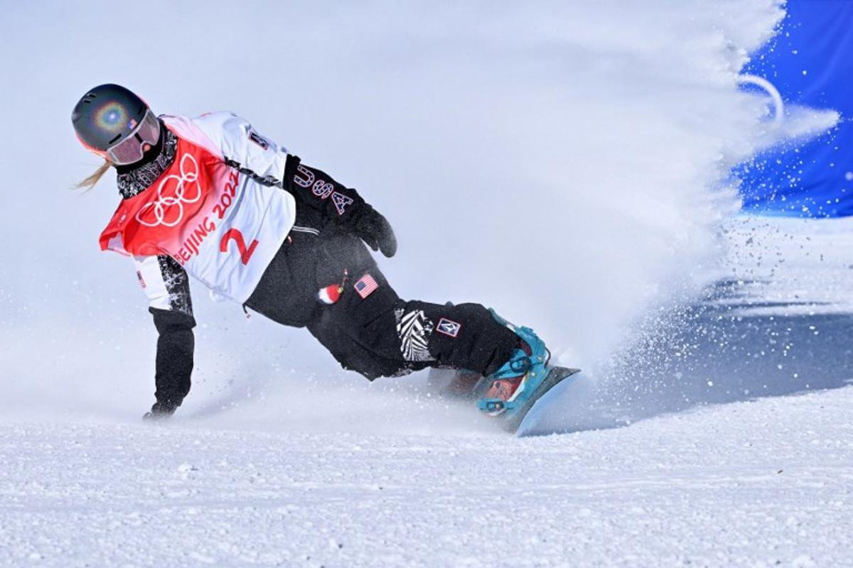 USA's Jamie Anderson competes in the snowboard women's slopestyle final run during the Beijing 2022 Winter Olympic Games at the Genting Snow Park H & S Stadium in Zhangjiakou on February 6, 2022. Ben STANSALL / AFP