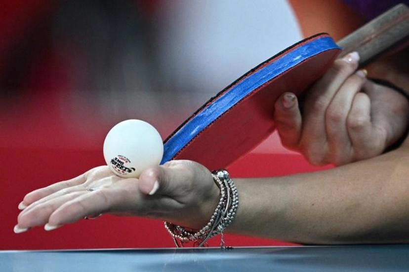 Romania's Bernadette Szocs serves to USA's Juan Liu during her women's singles round 3 table tennis match at the Tokyo Metropolitan Gymnasium during the Tokyo 2020 Olympic Games in Tokyo on July 27, 2021. Anne-Christine POUJOULAT / AFP