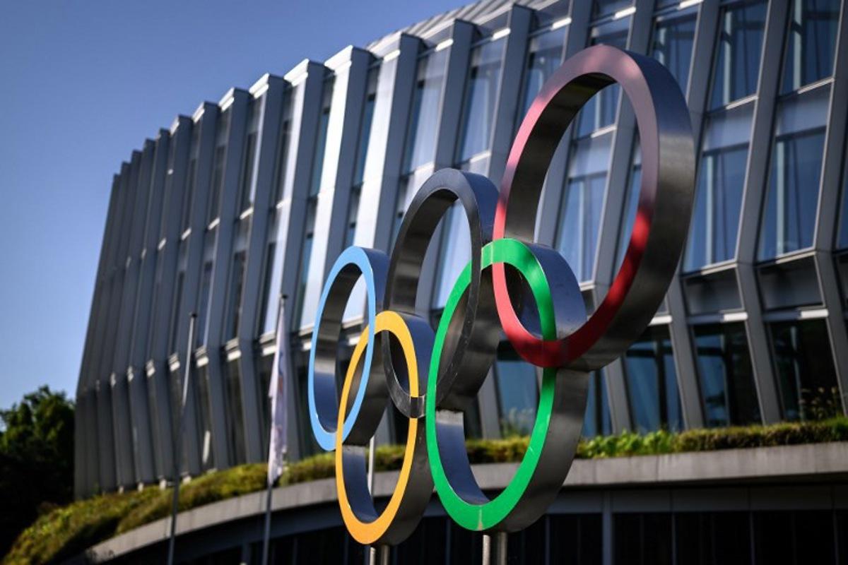 This photograph shows the Olympic rings prior to an IOC executive commission meeting ahead of IOC session, at the Olympic House in Lausanne, on June 22, 2026. Fabrice COFFRINI / AFP