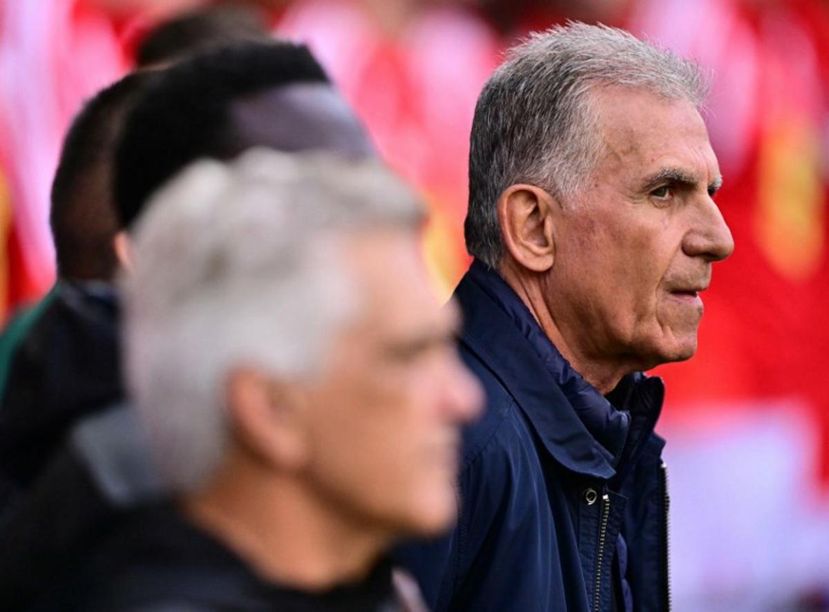 Ghana's Portugese manager Carlos Queiroz (R) reacts ahead of the international friendly football match between Wales and Ghana ahead of the 2026 FIFA World Cup football tournament, at Cardiff City Stadium, in Cardiff, on June 2, 2026. Ben STANSALL / AFP
