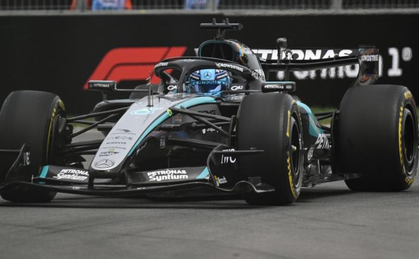 Mercedes' British driver George Russell races during the Sprint race ahead of the 2026 Formula 1 Grand Prix du Canada at Circuit Gilles-Villeneuve in Montreal, Canada, on May 23, 2026. Andrej Ivanov / AFP