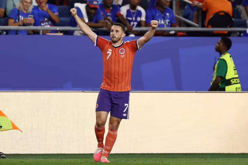 Scotland's midfielder #07 John McGinn celebrates after scoring his team's first goal during the 2026 World Cup Group C football match between Haiti and Scotland at the Boston Stadium in Foxborough on June 13, 2026. FRANCK FIFE / AFP