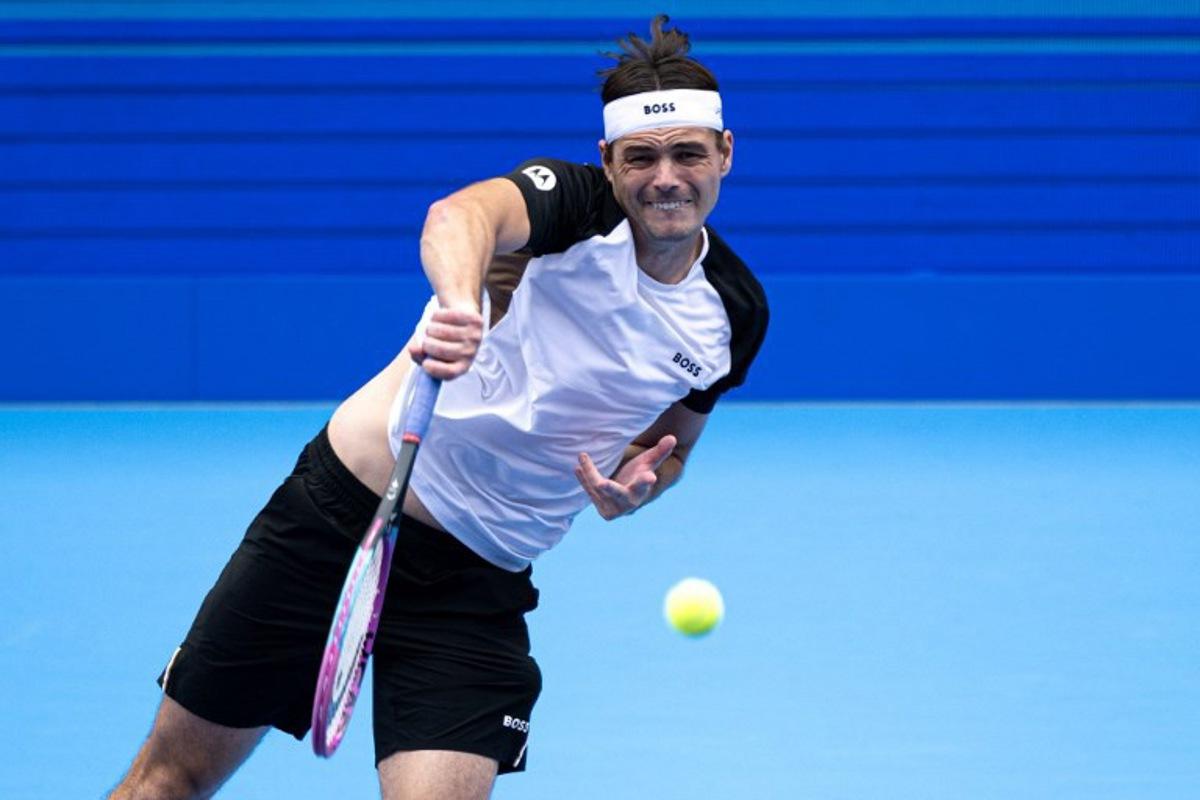 USA's Taylor Fritz serves against USA's Sebastian Korda during their men's singles match at the ATP Japan Open tennis tournament in Tokyo on September 28, 2025. Philip FONG / AFP