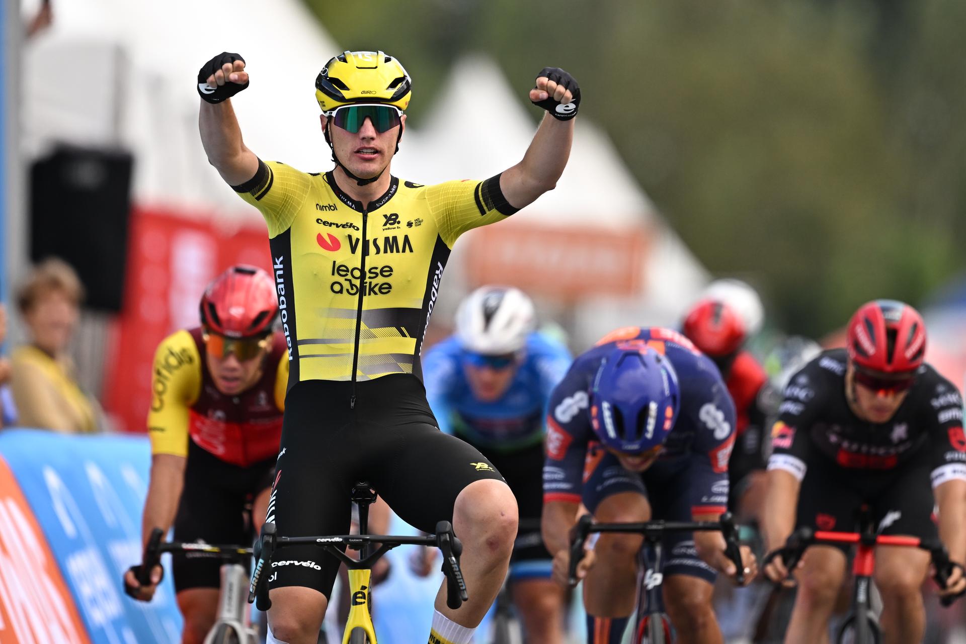 Dutch Olav Kooij of Team Visma-Lease a Bike celebrates after winning the second stage of the 'Renewi Tour' multi-stage cycling race, from Blankenberge to Ardooie (169,4 km) on Thursday 21 August 2025. The five-day race takes place in Belgium and the Netherlands. BELGA PHOTO DAVID PINTENS