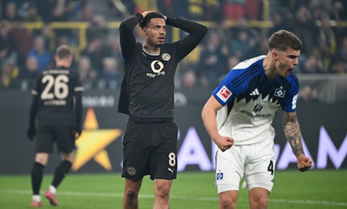 Dortmund's German midfielder #08 Felix Nmecha reacts during the German first division Bundesliga football match between Borussia Dortmund and HSV Hamburg in Dortmund, western Germany, on March 21, 2026. UWE KRAFT / AFP