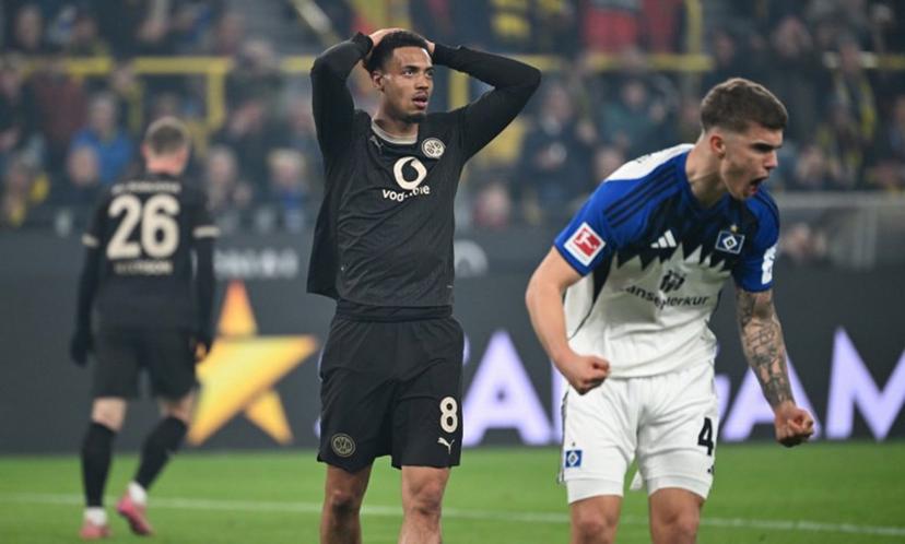 Dortmund's German midfielder #08 Felix Nmecha reacts during the German first division Bundesliga football match between Borussia Dortmund and HSV Hamburg in Dortmund, western Germany, on March 21, 2026. UWE KRAFT / AFP
