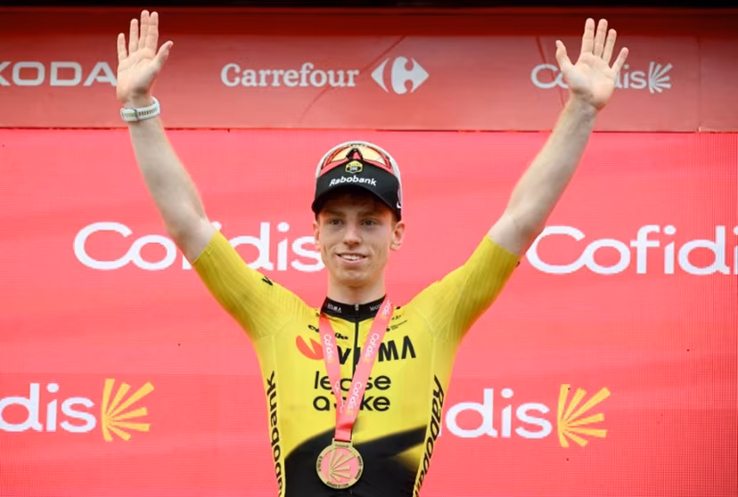 Team Visma-Lease a bike's British rider Matthew Brennan celebrates on the podium after winning the 11th stage of the Vuelta a Espana 2026 cycling tour, a 151,3 km race between Carthagena and Lorca, on September 2, 2026. JOSE JORDAN / AFP
