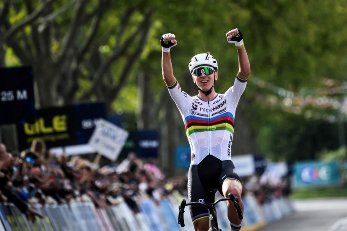 Slovenian rider Tadej Pogacar celebrates as he wins the men's Elite Road Race at the European Cycling Championship 2025 near Valence, southeastern France on October 5, 2025. JEFF PACHOUD / AFP