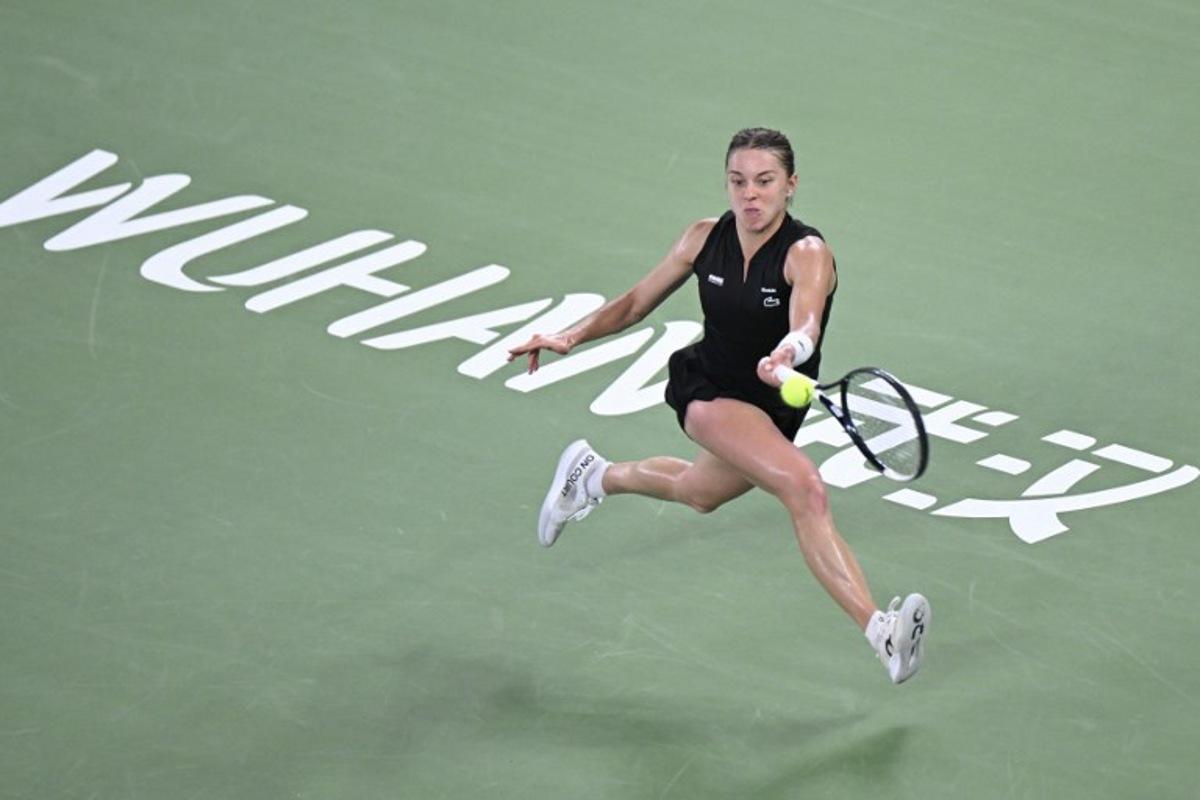 Poland's Maja Chwalinska hits a return to Poland's Iga Swiatek during their women's singles semi-final match at the Wuhan Open tennis tournament in Wuhan, China's Hubei province on October 17, 2026. WANG Zhao / AFP