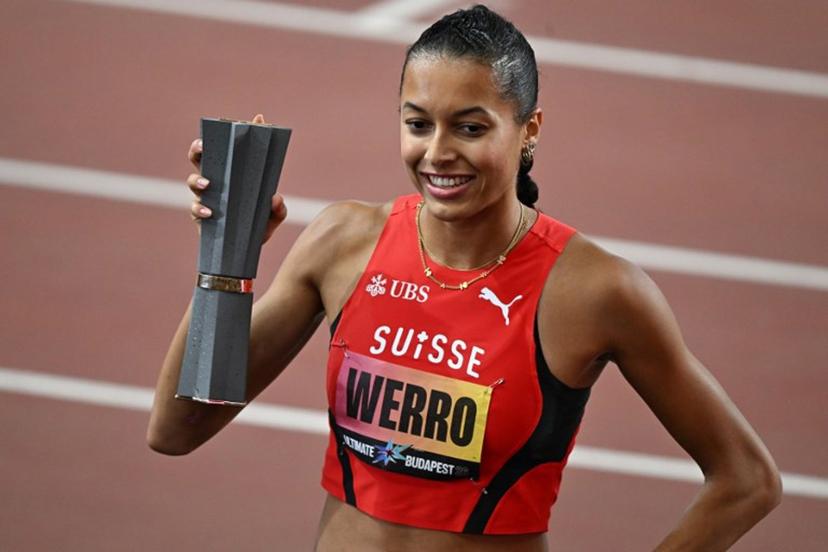 Switzerland's Audrey Werro celebrates with the trophy after winning the women's 800m final during the World Athletics Ultimate Championship at the Gyula Zsivotzky National Athletics Centre, in Budapest on September 12, 2026. Attila KISBENEDEK / AFP