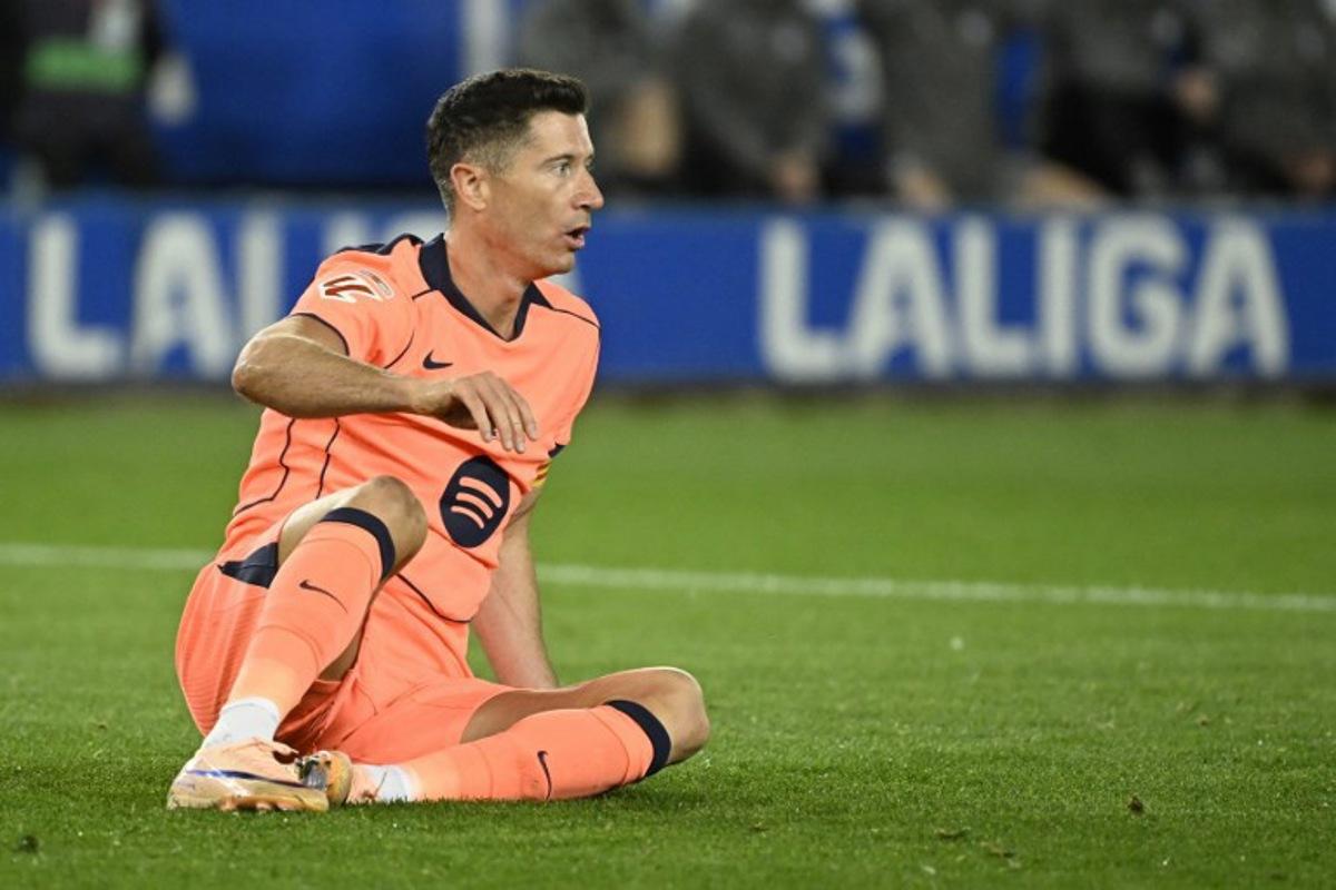 Barcelona's Polish forward #09 Robert Lewandowski reacts during the Spanish league football match between Deportivo Alaves and FC Barcelona at Mendizorroza Stadium in Vitoria on May 13, 2026. ANDER GILLENEA / AFP