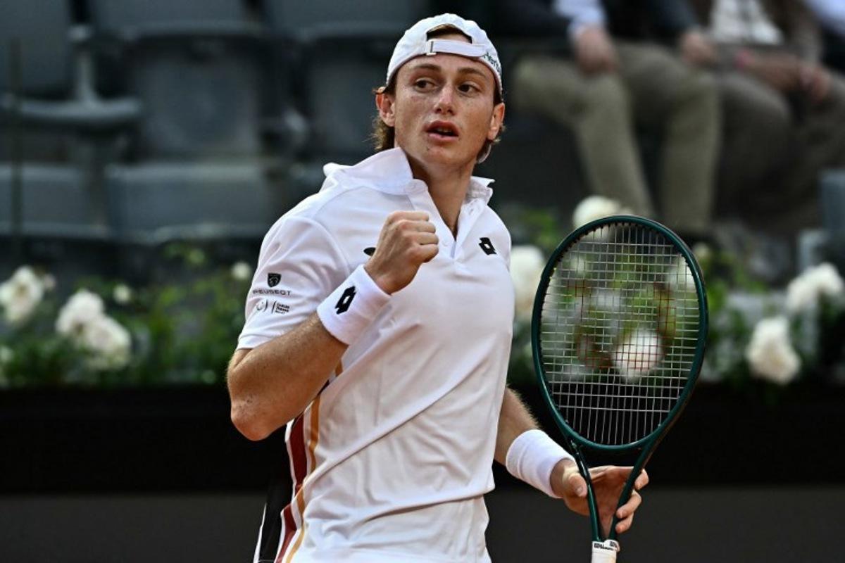 Peru's Ignacio Buse reacts after a point as he plays against to Italy's Lorenzo Sonego during their men's singles match of the WTA Rome Open tennis tournament at the Foro Italico in Rome on May 7, 2026. Filippo MONTEFORTE / AFP