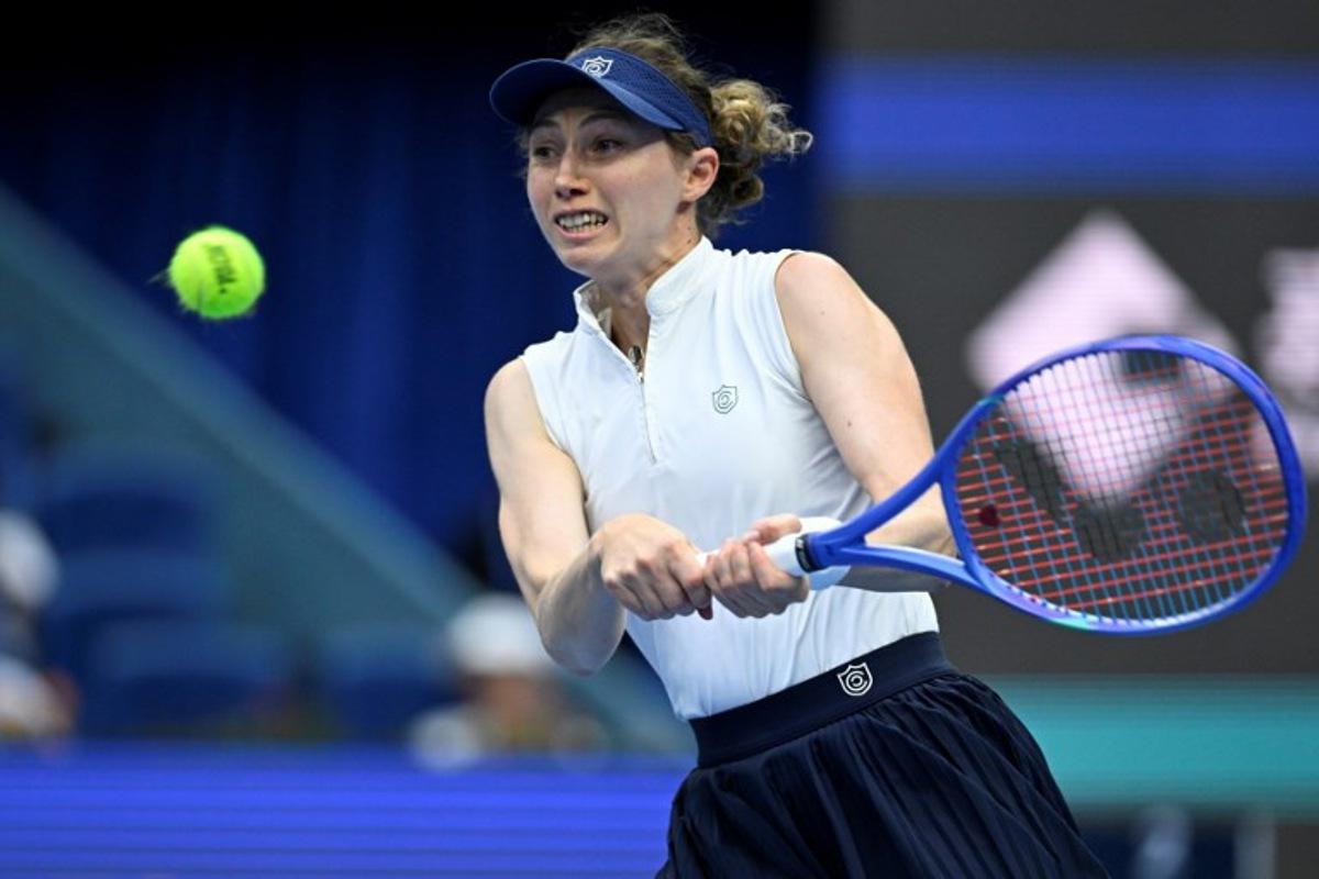 Spain's Cristina Bucsa hits a return to Croatia's Donna Vekic during their women's singles match at the China Open tennis tournament in Beijing on September 25, 2025. WANG Zhao / AFP
