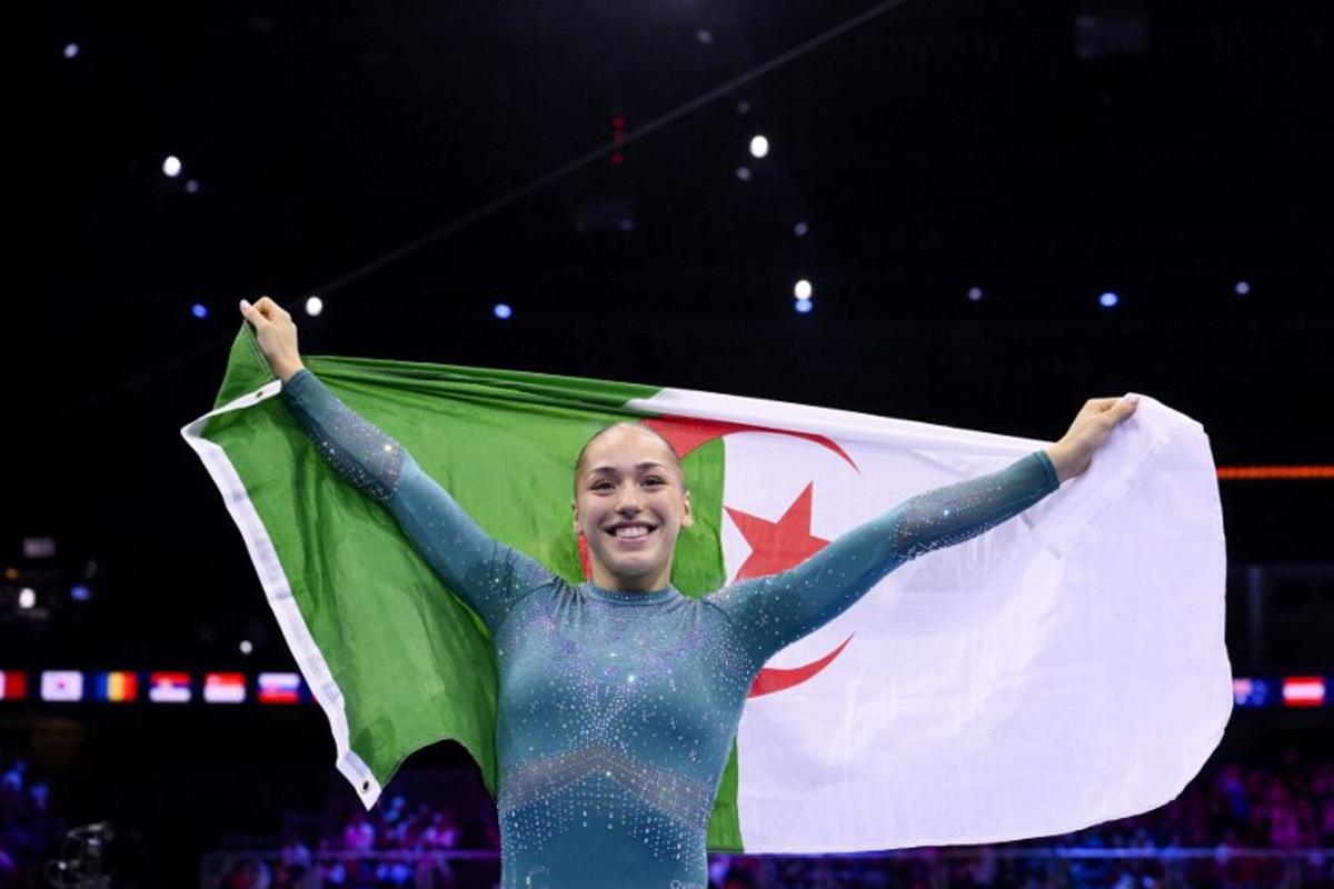 Algeria's Kaylia Nemour reacts after winning the Women's Balance Beam Final during the 54th FIG Artistic Gymnastics World Championships, in Rotterdam, southern Netherlands, on October 25, 2026. JOHN THYS / AFP