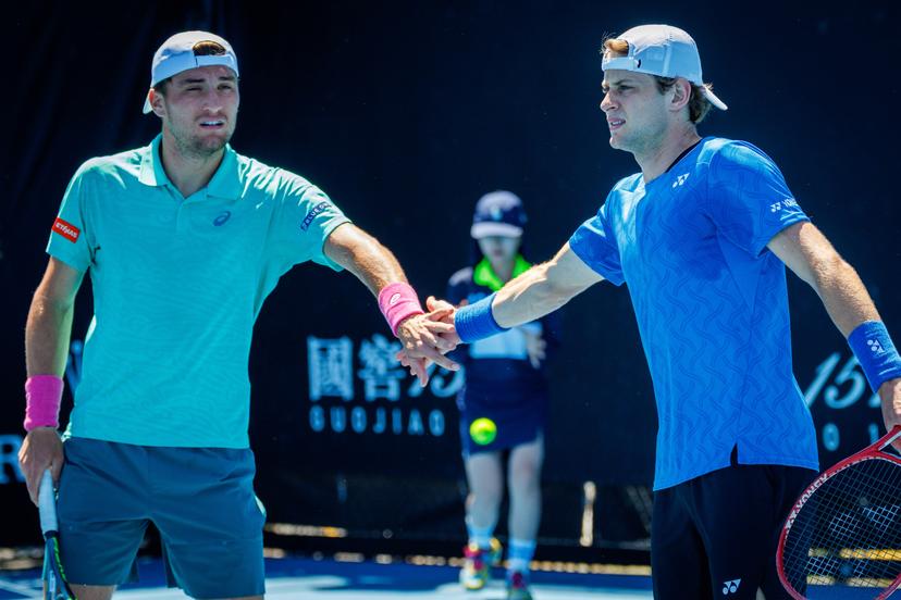 Belgian Raphael Collignon, Belgian Zizou Bergs and pictured during a first round match of Belgium's Bergs/Collignon against Australia's pair McCabe/Tu in the men doubles at the Australian Open, Melbourne Park, Melbourne on Wednesday 21 January 2026. McCabe/Tu won the game. BELGA PHOTO PATRICK HAMILTON --- BENELUX ONLY ---