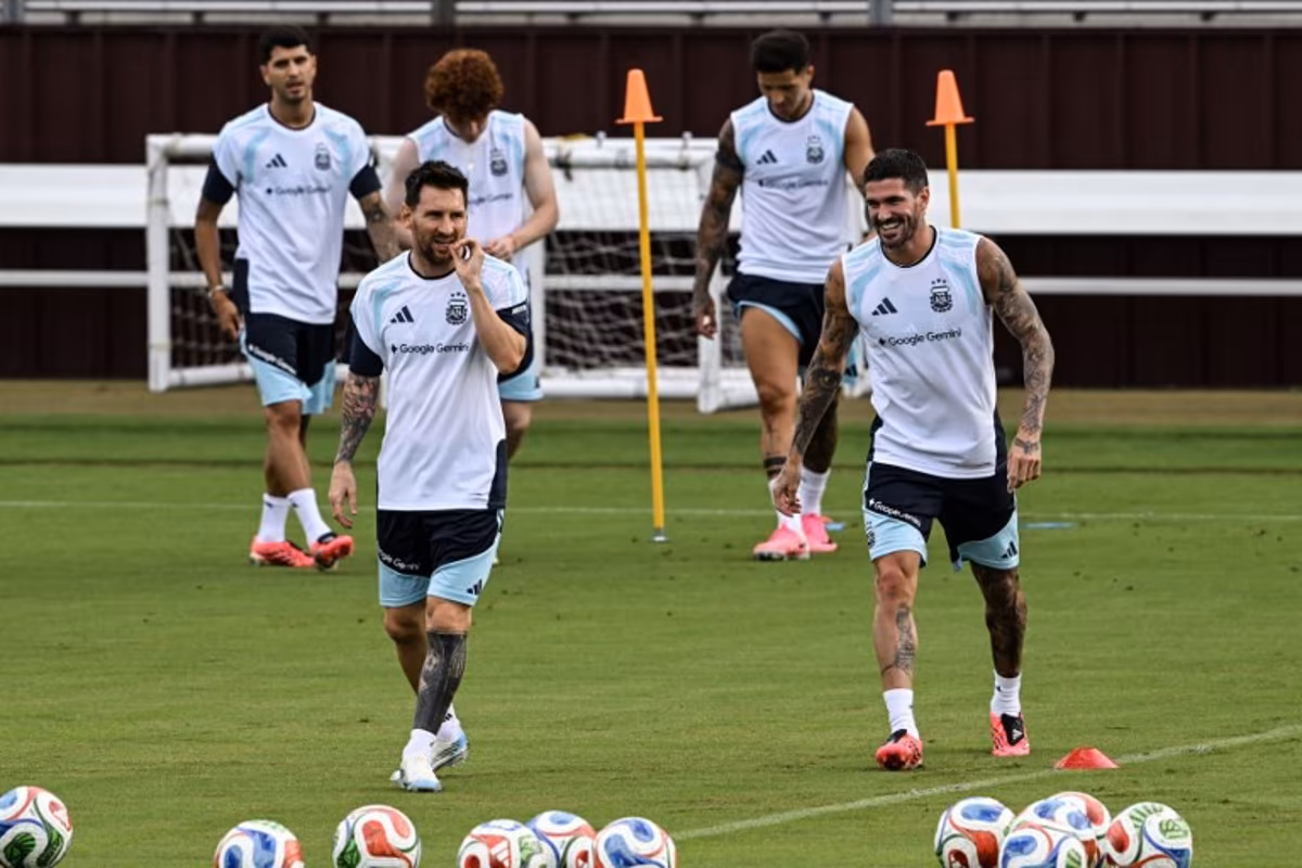 Argentina's players Lionel Messi (L) and Rodrigo De Paul (R) participate in a training session at Kyle Field in College Station, Texas, on June 5, 2026, the day before a friendly match against Honduras. Argentina will face Honduras in a friendly match on June 6, 2026. RONALDO SCHEMIDT / AFP