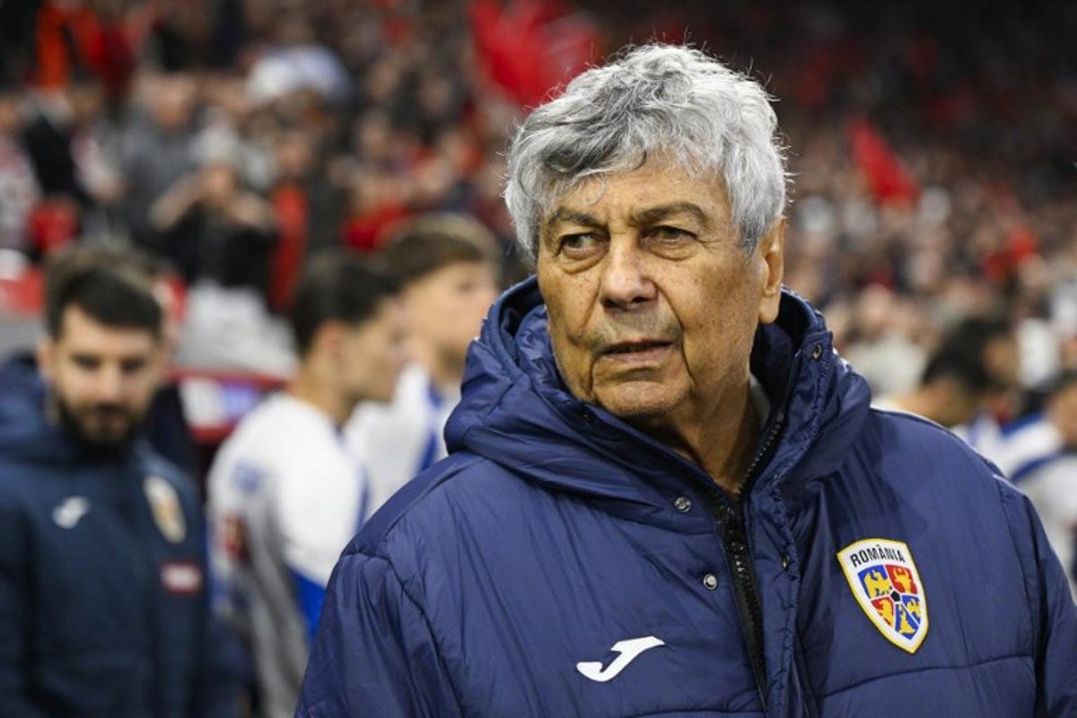 Romania's headacoach Mircea Lucescu looks on ahead of the play-off FIFA World Cup 2026 European qualification knockout semi-final football match between Turkey and Romania at Besiktas Park stadium, in Istanbul on March 26, 2026. YASIN AKGUL / AFP